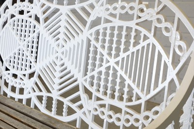 Lot 180 - A cast iron garden bench
