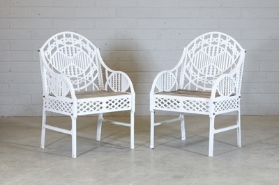 Lot 181 - A pair of cast iron garden chairs