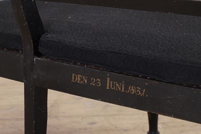 Lot 10 - A Regency-style ebonised and parcel-gilt chair-back settee