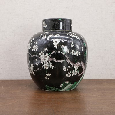 Lot 251 - A Chinese famille noire jar and cover