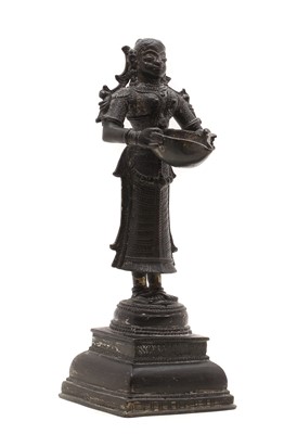 Lot 142 - A bronze Dipa Lakshmi oil lamp