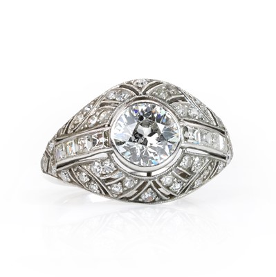 Lot 69 - A French Art Deco platinum and diamond bombé ring
