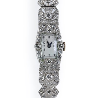 Lot 336 - An Art Deco ladies' diamond set cocktail watch, c.1925