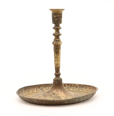 Lot 238 - An Ottoman brass and gilt copper candlestick