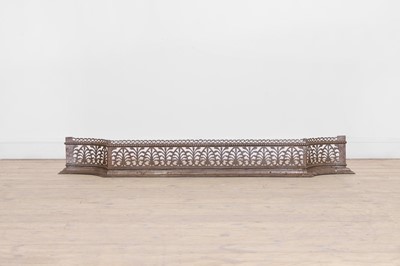 Lot 394 - A George III polished steel fender