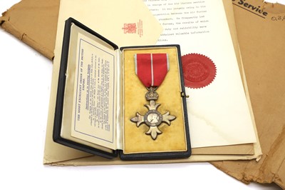 Lot 261 - A George VI OBE medal