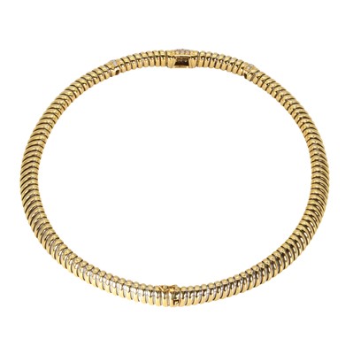 Lot 205 - A two-colour diamond Cartier Tubogas collar necklace