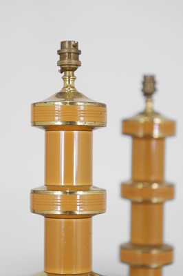 Lot 135 - A pair of painted metal lamps