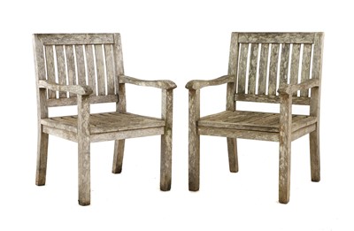 Lot 413 - A pair of teak garden chairs