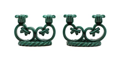 Lot 110A - A pair of glazed pottery candlesticks
