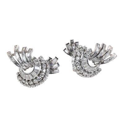 Lot 84 - A pair of platinum and diamond spray clip earrings, c.1940