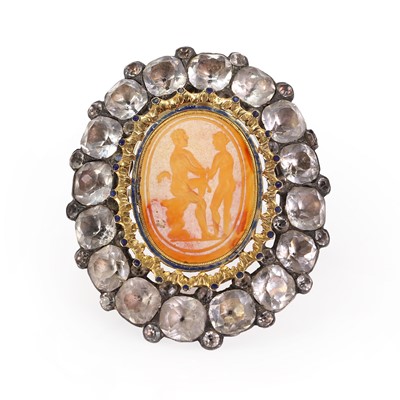 Lot 3 - A silver mounted black dot paste and carnelian intaglio brooch