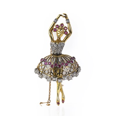 Lot 79 - A gold ruby and diamond set Ballerina brooch