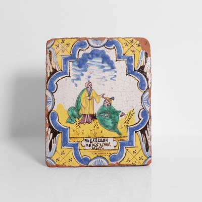 Lot 157 - A glazed earthenware tile
