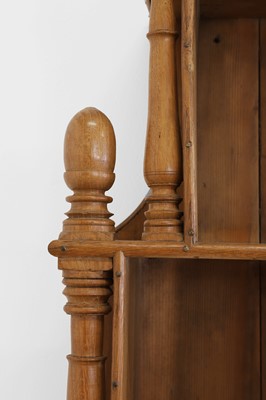 Lot 140 - A set of fruitwood and pine wall-hanging shelves