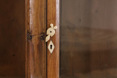 Lot 140 - A set of fruitwood and pine wall-hanging shelves