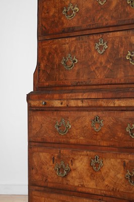 Lot 25 - A George II figured walnut secretaire chest on chest
