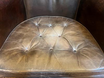 Lot 113 - A George III mahogany barrel-back armchair