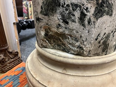 Lot 168 - A white and black grained marble column