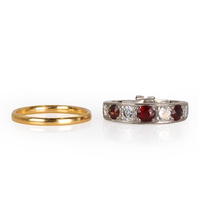 Lot 271 - An 18ct white gold ruby and diamond ring and a gold wedding ring