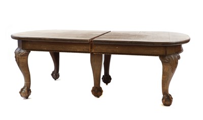 Lot 37 - A George II style mahogany extending dining table