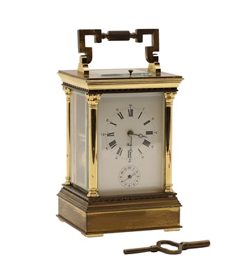 Lot 105 - A gilt brass carriage clock
