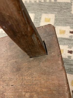 Lot 28 - A primitive elm joined bench
