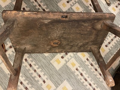 Lot 28 - A primitive elm joined bench