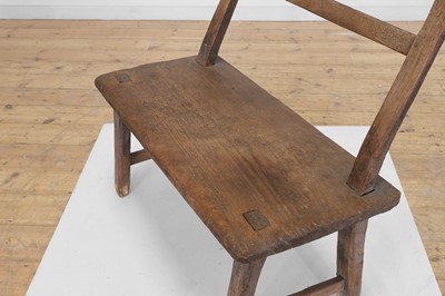Lot 28 - A primitive elm joined bench
