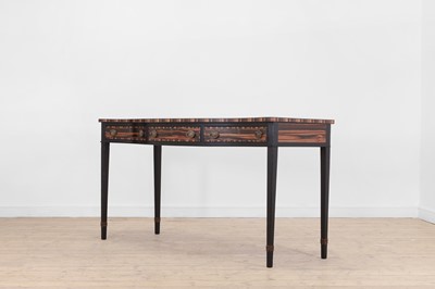 Lot 336 - A George III coromandel and ebonised serving table