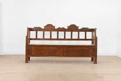 Lot 194 - A painted pine box settle