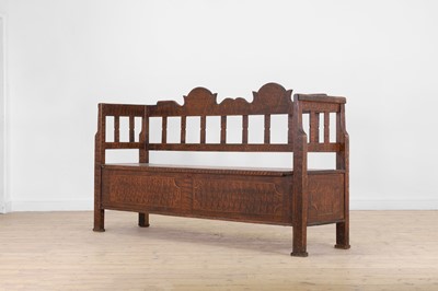 Lot 194 - A painted pine box settle