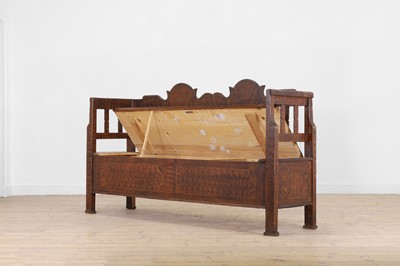 Lot 194 - A painted pine box settle