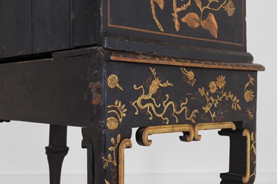 Lot 13 - A black lacquer and gilt-japanned chest on stand