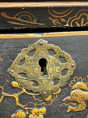 Lot 13 - A black lacquer and gilt-japanned chest on stand