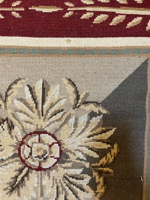 Lot 116 - A needlepoint wool carpet of Robert Adam design