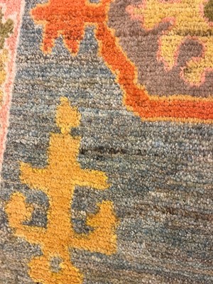 Lot 5 - An Oushak wool carpet
