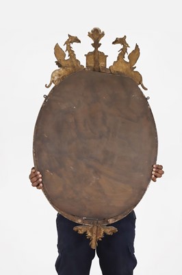Lot 359 - A George III giltwood oval mirror