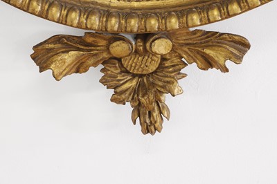 Lot 359 - A George III giltwood oval mirror