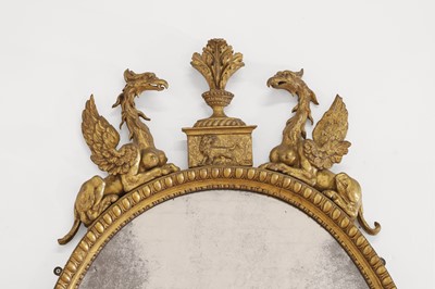 Lot 359 - A George III giltwood oval mirror