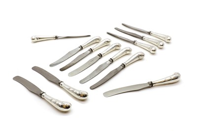 Lot 21 - A set of twelve silver-handled pistol grip knives