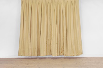 Lot 225 - A pair of pale gold striped silk curtains