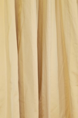 Lot 225 - A pair of pale gold striped silk curtains