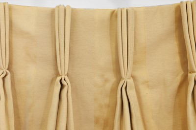 Lot 225 - A pair of pale gold striped silk curtains