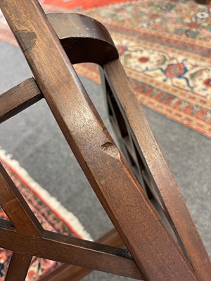 Lot 66 - A set of four George III-style mahogany 'cockpen' elbow chairs