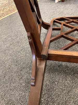 Lot 66 - A set of four George III-style mahogany 'cockpen' elbow chairs