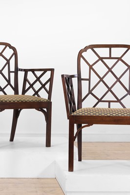 Lot 66 - A set of four George III-style mahogany 'cockpen' elbow chairs