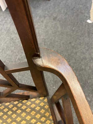 Lot 66 - A set of four George III-style mahogany 'cockpen' elbow chairs