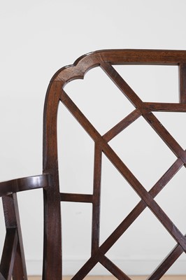Lot 66 - A set of four George III-style mahogany 'cockpen' elbow chairs