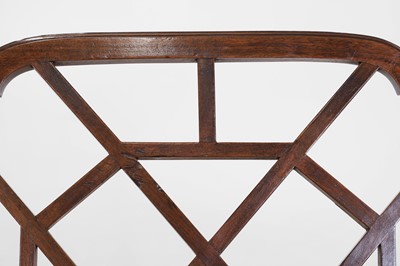 Lot 66 - A set of four George III-style mahogany 'cockpen' elbow chairs